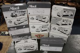FOURTEEN BOXED FIRST GEAR FIRE ENGINES AND FIRE RELATED VEHICLES, 1:30 and 1:34 scales
