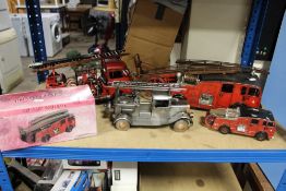 TWO TIN PLATE FIRE ENGINES, a metal fire engine and two fire engine money boxes
