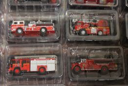FIFTY FIRE ENGINES IN CLEAR PLASTIC SEALED BOXES
