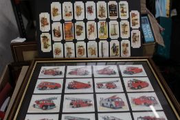 A QUANTITY OF FIRE RELATED PLAYERS CIGARETTE CARDS, two framed frameability fire engine card sets,