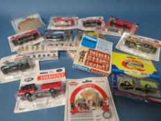 CIRCA EIGHTY CARDED EMERGENCY SERVICES VEHICLES BY BOLEY, together with ten sets of firemen / people
