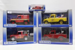 A COLLECTION OF UNIVERSAL HOBBIES DIE CAST LAND ROVER FIRE VEHICLES, mainly 1:18 scale