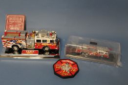 A BOXED CODE 3 COLLECTABLES 1:64 SCALE LIMITED EDITION SEAGRAVE REAR MOUNT LADDER, together with a