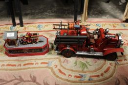 CAST IRON FIRE STATION / FIRE ENGINE MONEY BOX TOGETHER WITH A TIN PLATE FIRE ENGINE