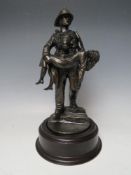 A BALLANTYNES OF WALKERBURN MODERN RESIN FIREMAN WITH CHILD FIGURE