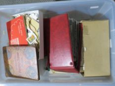 PLASTIC CRATE WITH STAMPS, CATALOGUES, EPHEMERA ETC., much G.B., (some still on paper), P.H.Q.