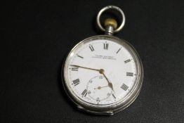 AN ANTIQUE SILVER CASED POCKET WATCH BY H SAMUEL