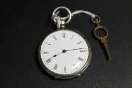 A VICTORIAN KEY WIND POCKET WATCH IN SILVER CASE