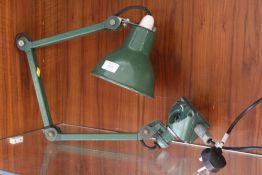 A VINTAGE GREEN ENAMEL WALL MOUNTING ANGLE POISE LAMP