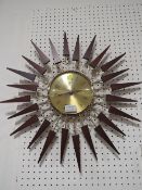 A RETRO PAICO STARBURST WALL CLOCK TOGETHER WITH A METAMEC WALL CLOCK (2)
