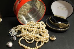 A SMALL QUANTITY OF COSTUME JEWELLERY PLUS A WRISTWATCH