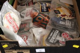 A TRAY OF BEER PUMP ADVERTISING PLAQUES, BADGES