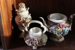 THREE CONTINENTAL ELABORATE CERAMIC PIECES TO INCLUDE A LIDDED TWIN HANDLED URN