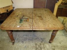 A MID VICTORIAN MAHOGANY WIND-OUT TABLE WITH TWO EXTRA LEAVES - HANDLE L-119 CM EXTENDED L-205 CM