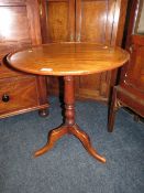 A TRADITIONAL MAHOGANY TILT-TOP PEDESTAL TABLE