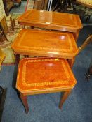 A NEST OF THREE ITALIAN STYLE TABLES