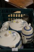 A TRAY OF RETRO CERAMICS TO INCLUDE A BLUE AND WHITE STRIPED TEAPOT