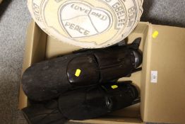 TWO EAST AFRICAN TRIBAL ART TANZANIAN MASKS, A CARVED NIGERIAN GOURD, TWO AFRICAN WALL PLAQUES AND