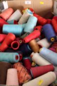 A TRAY OF ASSORTED SEWING MACHINE COTTON REELS