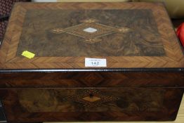 AN INLAID WOODEN WRITING SLOPE AND CONTENTS TO INCLUDE INKWELLS