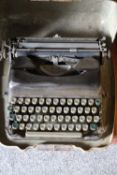 A DECO CASED PORTABLE TYPEWRITER