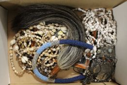A COLLECTION OF MIXED ETHNIC AND TRIBAL JEWELLERY INCLUDING SOUTH AFRICAN ZULU BEADWORK NATIVE