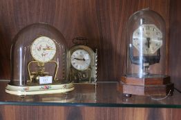 THREE VINTAGE DOMED CLOCKS