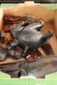 A BOX OF CARVED AFRICAN MASKS, FIGURES ETC