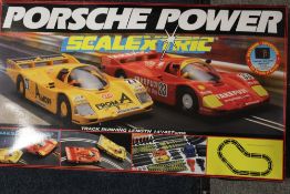 A SCALEXTRIC PORSCHE POWER SET (UNCHECKED)