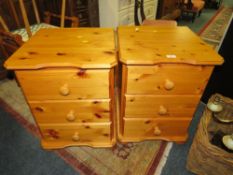 A PAIR OF HONEY PINE BEDSIDE CHESTS