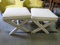 A PAIR OF MODERN UPHOLSTERED 'X' FOOTSTOOLS ( ON SHELVES )