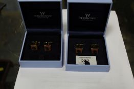 TWO PAIRS OF WEDGWOOD TERRACOTTA AND BLACK JASPERWARE BOXED CUFFLINK SETS