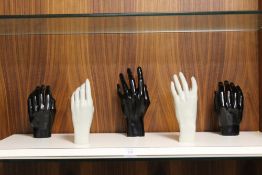 AN UNUSUAL MANNEQUIN HAND WALL MOUNTED COAT RACK
