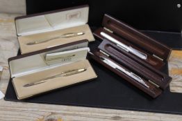 FOUR PENS TO INCLUDE TWO CASED CROSS PENS AND TWO SILVER EXAMPLES (4)