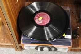 A MODERN RECORD PLAYER AND LOOSE RECORDS