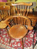 A TRADITIONAL ANTIQUE WINDSOR ARMCHAIR