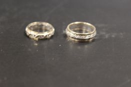 TWO 9CT GOLD AND SILVER ETERNITY RINGS