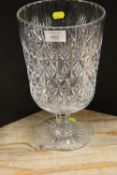 A LARGE CUT GLASS FOOTED VASE