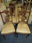 A SET OF FOUR EDWARDIAN MAHOGANY DINING CHAIRS