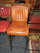 A TAN LEATHER BAR/KITCHEN STOOL