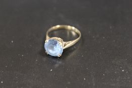 A 9CT GOLD AQUAMARINE DRESS RING