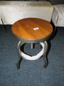 A LOW INDUSTRIAL STYLE WIND-UP STOOL