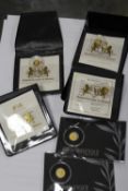 A TIN CONTAINING TWO UNOPENED PERTH MINT GOLD 0.5G COMMEMORATIVE GOLD COINS TOGETHER WITH FOUR