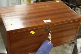 A COIN COLLECTORS CABINET CONTAINING 12 'SHELVES OF MOSTLY FOREIGN COINAGE