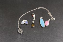 A COLLECTION OF VINTAGE GEMSTONE PENDANTS