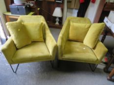A PAIR OF MODERN MUSTARD COLOURED ARMCHAIRS WITH METAL BASES
