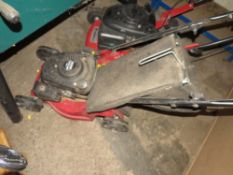 A MOUNTFIELD PETROL MOWER WITH BOX