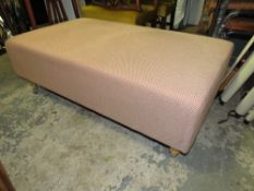 A LARGE MODERN FOOTSTOOL
