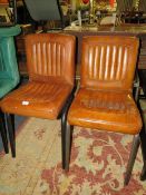 A PAIR OF MODERN TAN LEATHER DINING CHAIRS