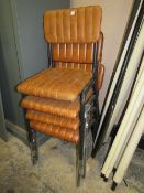 A SET OF FOUR TAN LEATHER DINING CHAIRS